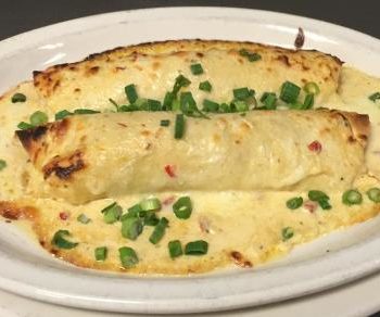 Take & Bake Seafood Enchiladas with Shrimp, Crab, whitefish and poblano cream sauce
